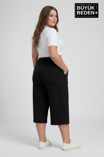Kadın Büyük Beden Unified Collective Baskılı Beli Lastikli Bol Paça Kapri Şort 3XL-6XL SPR26BSRK591-10